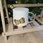 Elegant Ceramic Mug with Gold Handle